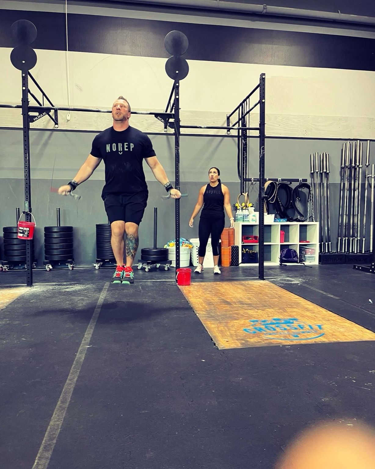 Athletes jumping rope in the gym